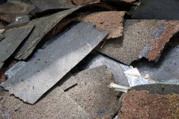Old Asphalt Shingles Piled on the Ground