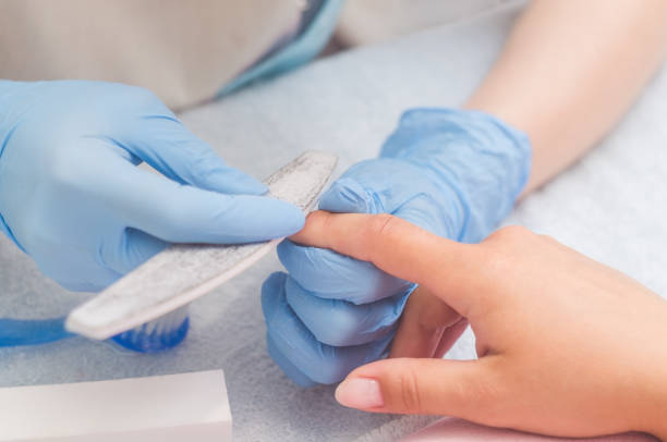 istock The master prepares the nails for manicure 819400020