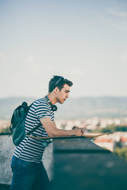istock Summer Portrait Of Skater Boy 819410108