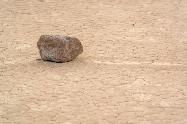 istock Sliding rock paving a path through the desert, Death valley NP 819410456