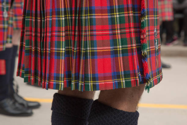 istock Male wearing kilt close up legs 819414872