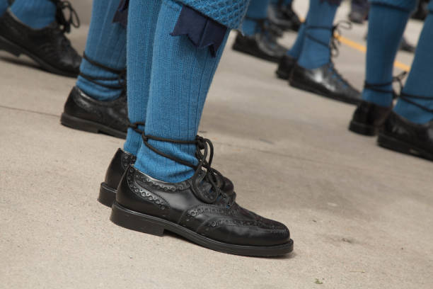 istock Low angle traditional scottish shoes blue stockings 819415190