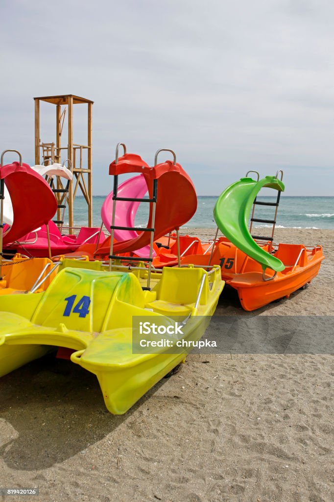 Pedalo Paddle Boats On The Beach Stock Photo - Download Image Now - Sea,  Beach, Coastline - iStock