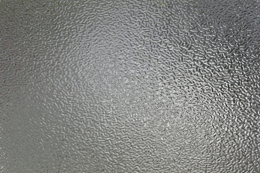 Surface of the glass background for design object backdrop, glass turbidity for interior Decorations.