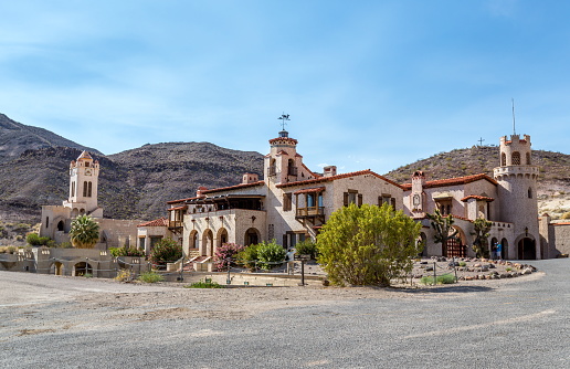 Scotty's Castle-Death Valley-California State, April 19 2015 : Scotty's Castle is a two-story Mission Revival and Spanish Colonial Revival style villa located in the Grapevine Mountains of northern Death Valley in Death Valley National Park in USA.