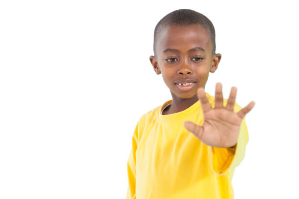 istock Happy little boy holding hand out 819448080