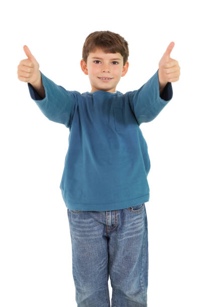 istock Happy little boy showing thumbs up 819448498