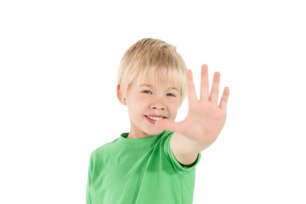 istock Cute little boy showing his hand 819448522