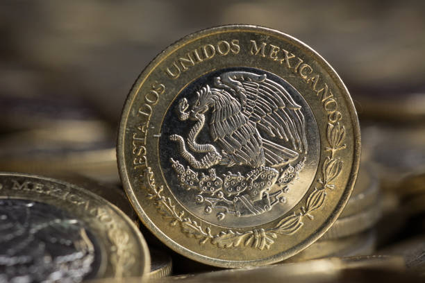 istock Main coin outlet 10 pesos centered with more coins in the background 819448608