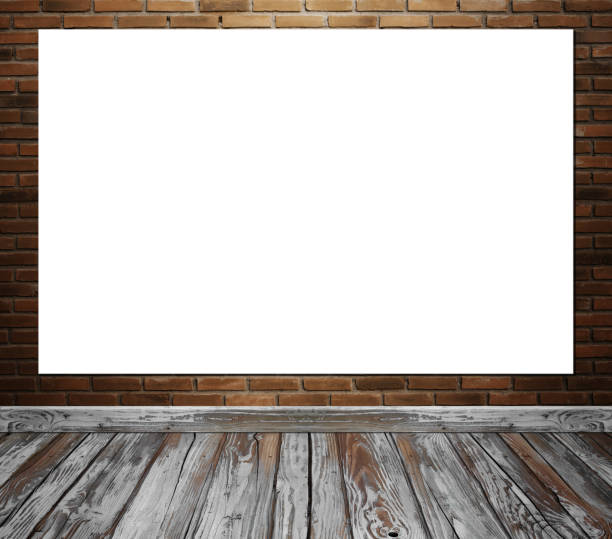 istock Empty poster in room interior with brick wall and wood floor background 819456150