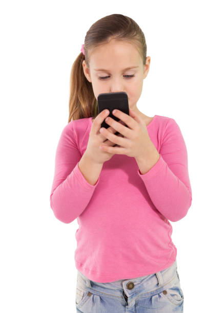istock Cute little girl using smartphone 819456560