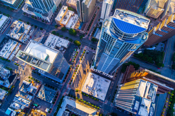 Looking down on one of the Tallest Residential Skyscrapers in Texas aerial drone view high above Austin , Texas looking straight down at Austonian Tower - Looking down on one of the Tallest Residential Skyscrapers in Texas austin texas photos stock pictures, royalty-free photos & images