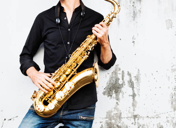istock Jazzman Musical Artist Playing Saxophone Concept 819474264