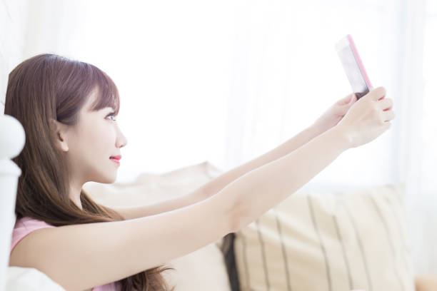 istock beauty woman selfie 819476738