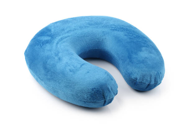 blue neck pillows isolated on white background stock photo