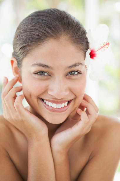 istock Beautiful brunette smiling at camera 819484390