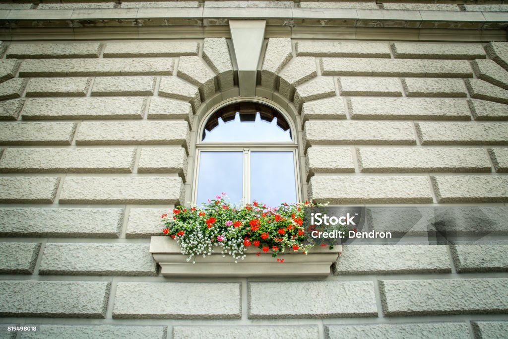 Window on the Bundeshaus A window with typical flower box in Bern, Switzerland 2016 Stock Photo