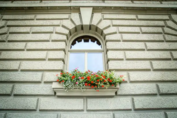 A window with typical flower box in Bern, Switzerland