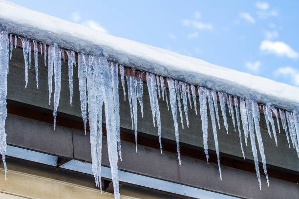 istock Icicle hanging from the side of the roof 819506956