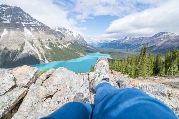 istock Personal perspective of man hiker resting on mountain trail 819521312