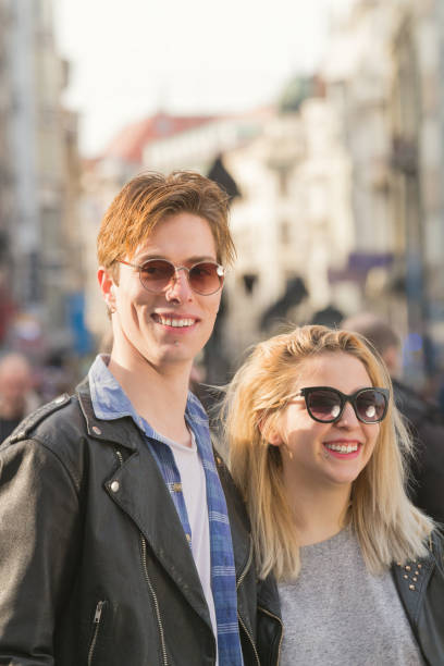 Young urban couple posing on the street. Young urban couple posing on the street. german free democratic party photos stock pictures, royalty-free photos & images