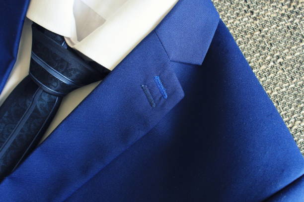 istock Classic blue suit, shirt and tie, close up, top view 819556746