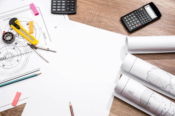istock measuring tools on the background of technical drawings. view on top 819557034