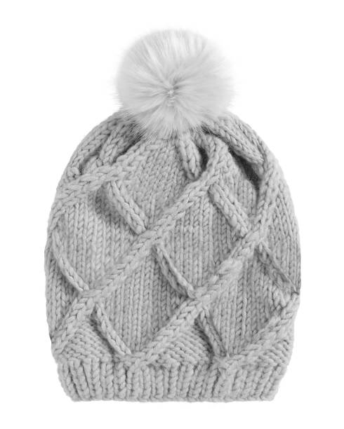 istock Gray warm winter knitted cap hat with a pom-pom isolated white 819581742