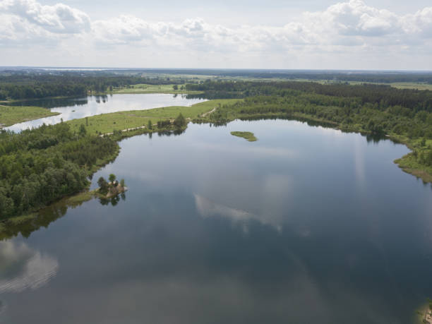 istock Sauriesi lake Aerial drone top view Latvia 819584502