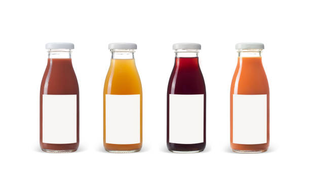 istock Fruit and vegetable juice bottles isolated on white background 819587672