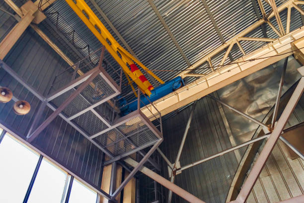 istock Fragment of overhead crane in the assembly workshop 819587792