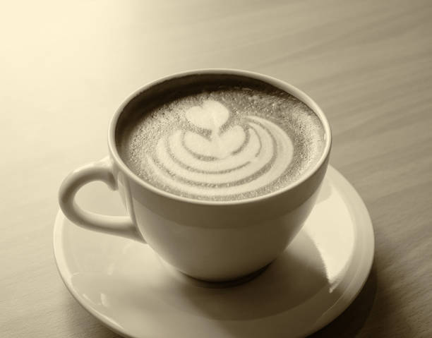 istock Cup of coffee with beautiful Latte art 819595402