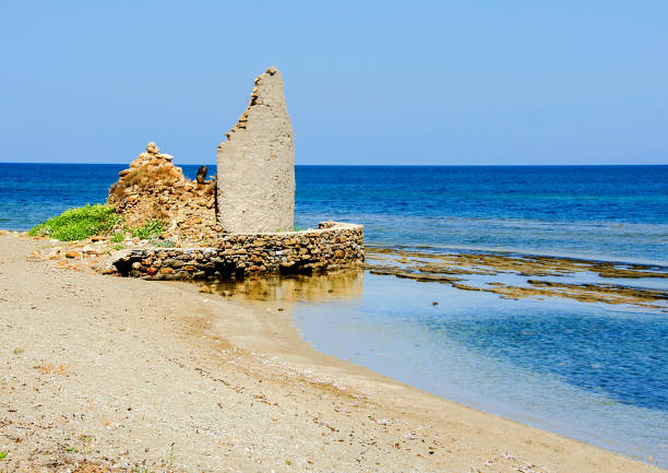 old building on the island, beautiful summer landscape, with clear water and blue sky, Greece