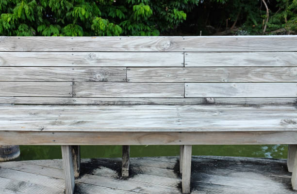 istock wood bench in pavilion. 819604636