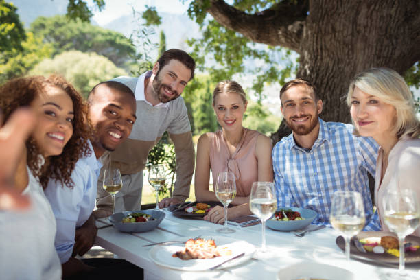 istock Smiling group of friends looking at camera 819612126