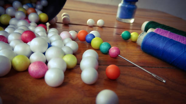 istock Color paints with sewing threads on wood background  and Colorful bubbles 819614946