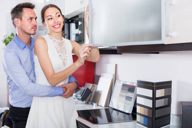 istock satisfied family selecting kitchen furniture 819636638