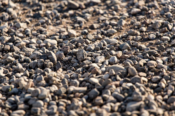 istock Crushed stone on the road as a background 819640552