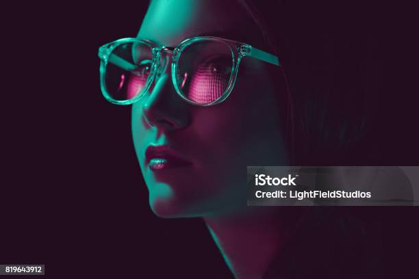 Headshot Of Stylish Young Woman In Sunglasses Looking Away Stock Photo - Download Image Now