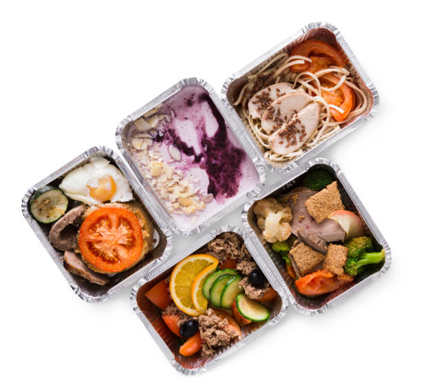 Healthy food take away in boxes, top view on white background