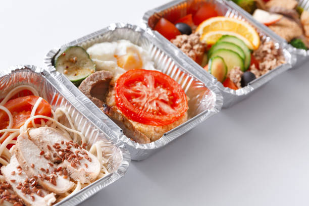 istock Healthy meals in boxes, diet concept. Meat with garnish and vegetables 819648066