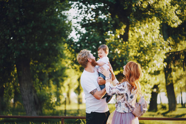 istock family in a park 819648126