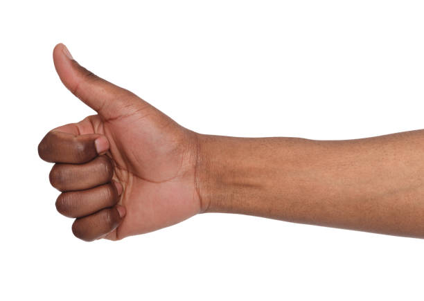 African american hand making thumb up gesture African american hand making thumb up gesture. Close-up of positive sign, like, agreement concept man hand down stock pictures, royalty-free photos & images
