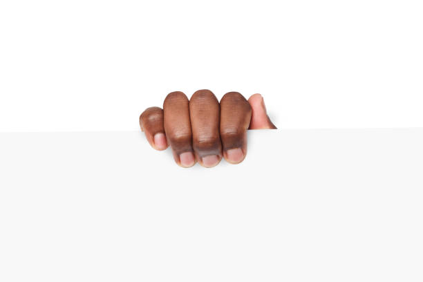 istock Black hand holding blank advertising card 819658782