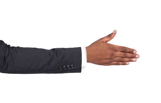 Hand ready for handshake isolated on white background. African american businessman inviting by open palm, greeting concept