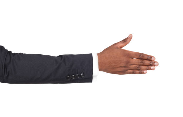 Hand ready for handshake isolated on white Hand ready for handshake isolated on white background. African american businessman inviting by open palm, greeting concept isolated colour stock pictures, royalty-free photos & images