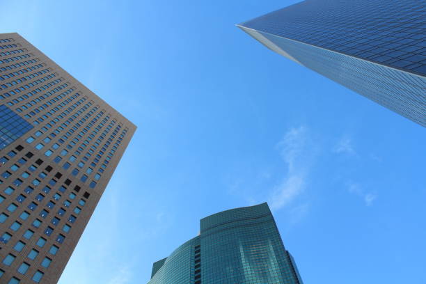 istock Look up buildings under the blue sky 819659802