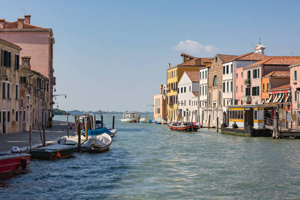 View of entrance of the Grand Canal with boats in Venice, Italy. stock photo
