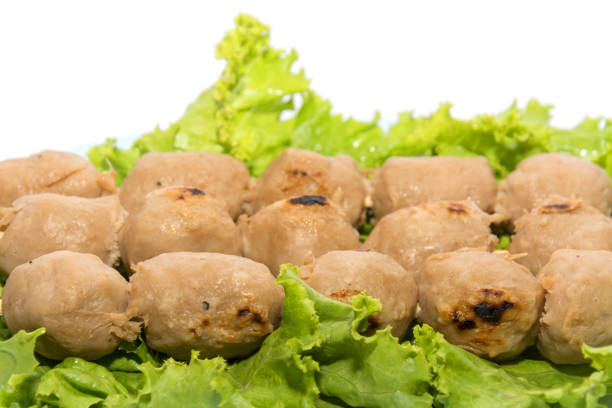 istock grilled meatball with sauce on white background 819662358