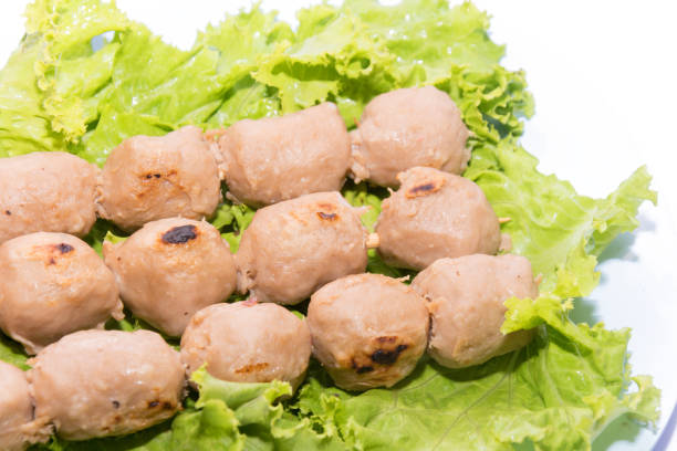 istock grilled meatball with sauce on white background 819664854